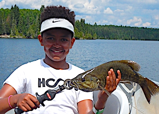 GREAT Trophy Smallmouth Bass Catch by Eli at Fireside Lodge in Canada